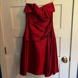 Strapless, red, satin, knee length dress.